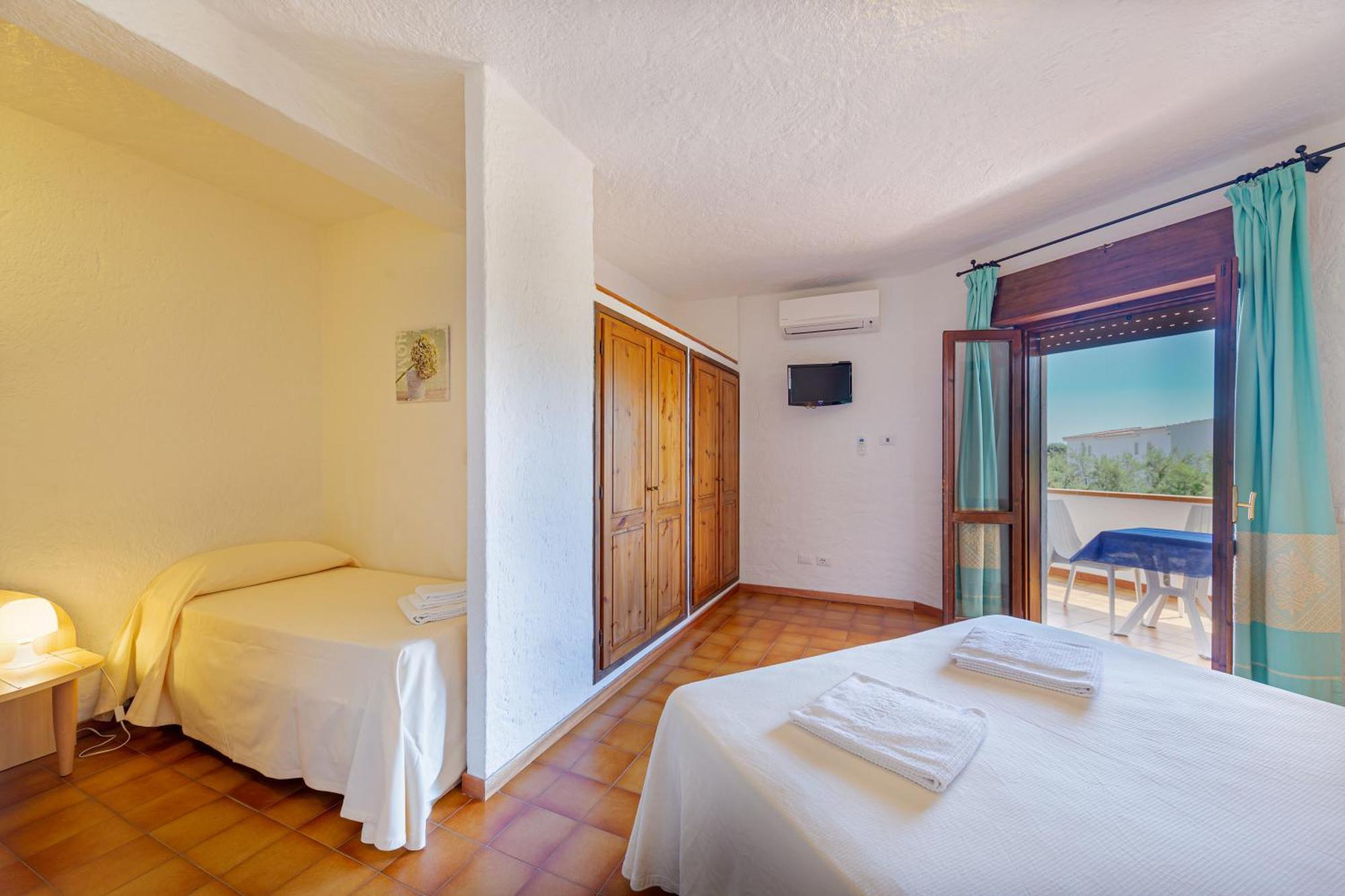 Quarto Duplo com Cama Extra